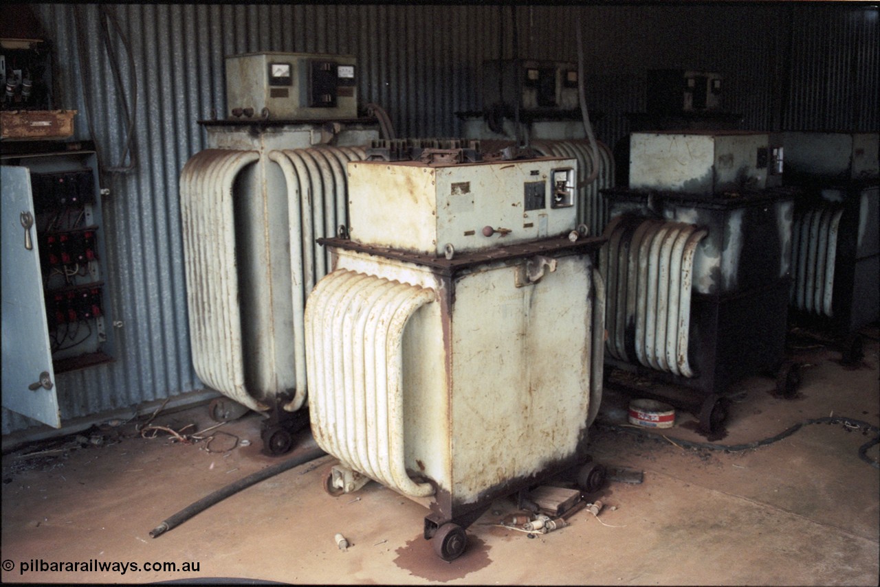 194-24
Wittenoom, Colonial Mine, asbestos mining remains, battery charging transformers in locomotive workshops.
