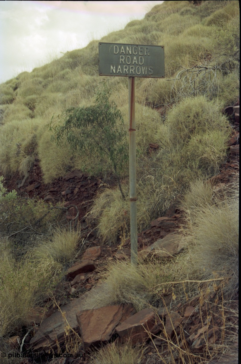 194-26
Wittenoom Gorge, Colonial Mine, asbestos mining remains, sign on one of the access roads around the mill.
