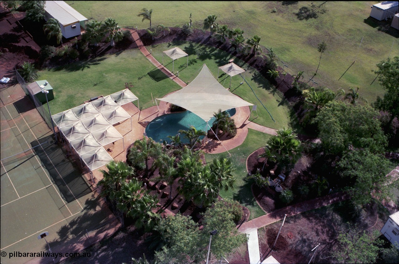 194-30
Yandi campsite for Henry Walker operated iron ore mine owned and managed by BHP, view of camp are from man cage on Kato 50 tonne hydraulic crane.
