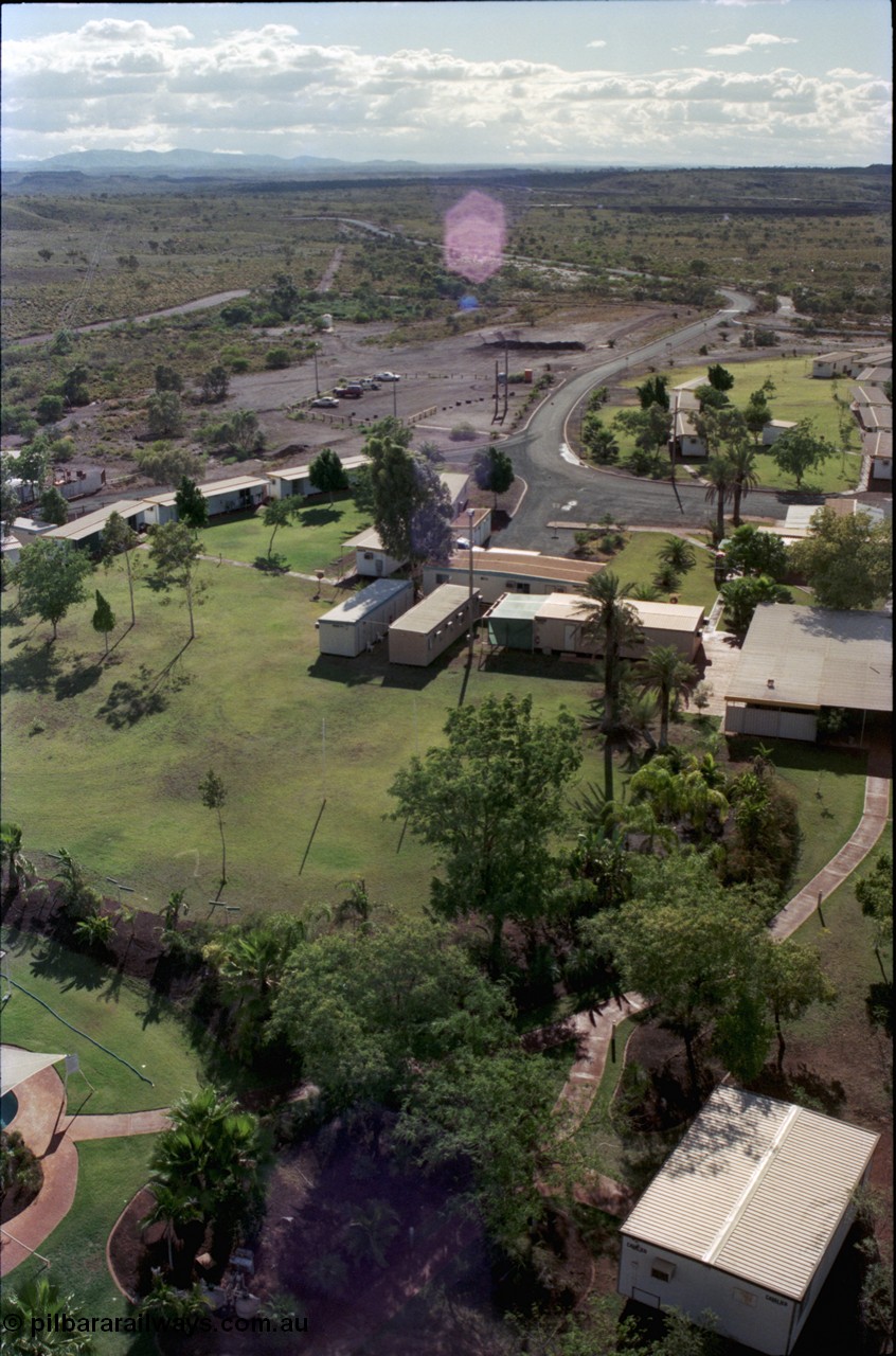 194-32
Yandi campsite for Henry Walker operated iron ore mine owned and managed by BHP, view of camp are from man cage on Kato 50 tonne hydraulic crane.
