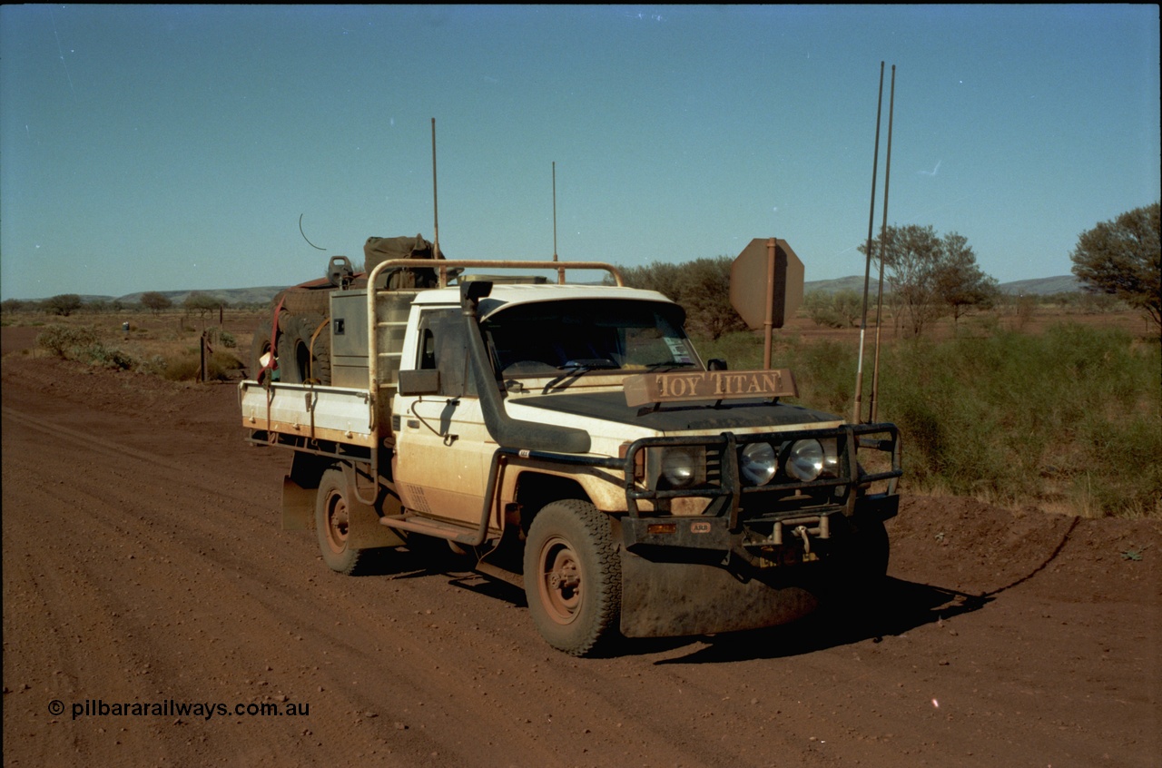 195-01
Munjina, end of Roy Hill Road where it meets the Great Northern Highway, Toyota HJ75 Landcruiser, loaded up to the max, it has a 13 leaf spring pack on the rear, 9 on the front, PTO winch, in route to Wittenoom.
