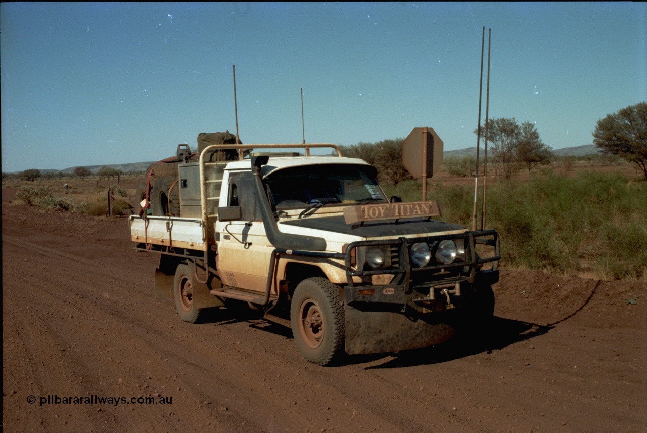195-02
Munjina, end of Roy Hill Road where it meets the Great Northern Highway, Toyota HJ75 Landcruiser, loaded up to the max, it has a 13 leaf spring pack on the rear, 9 on the front, PTO winch, in route to Wittenoom.
