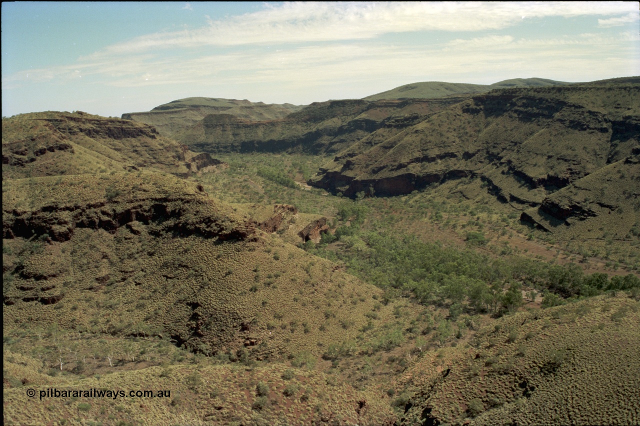 195-20
Wittenoom Gorge, view looking north along Joffre Creek, the former market garden area is in the middle, with Bolitho Rd skirting the creek.
