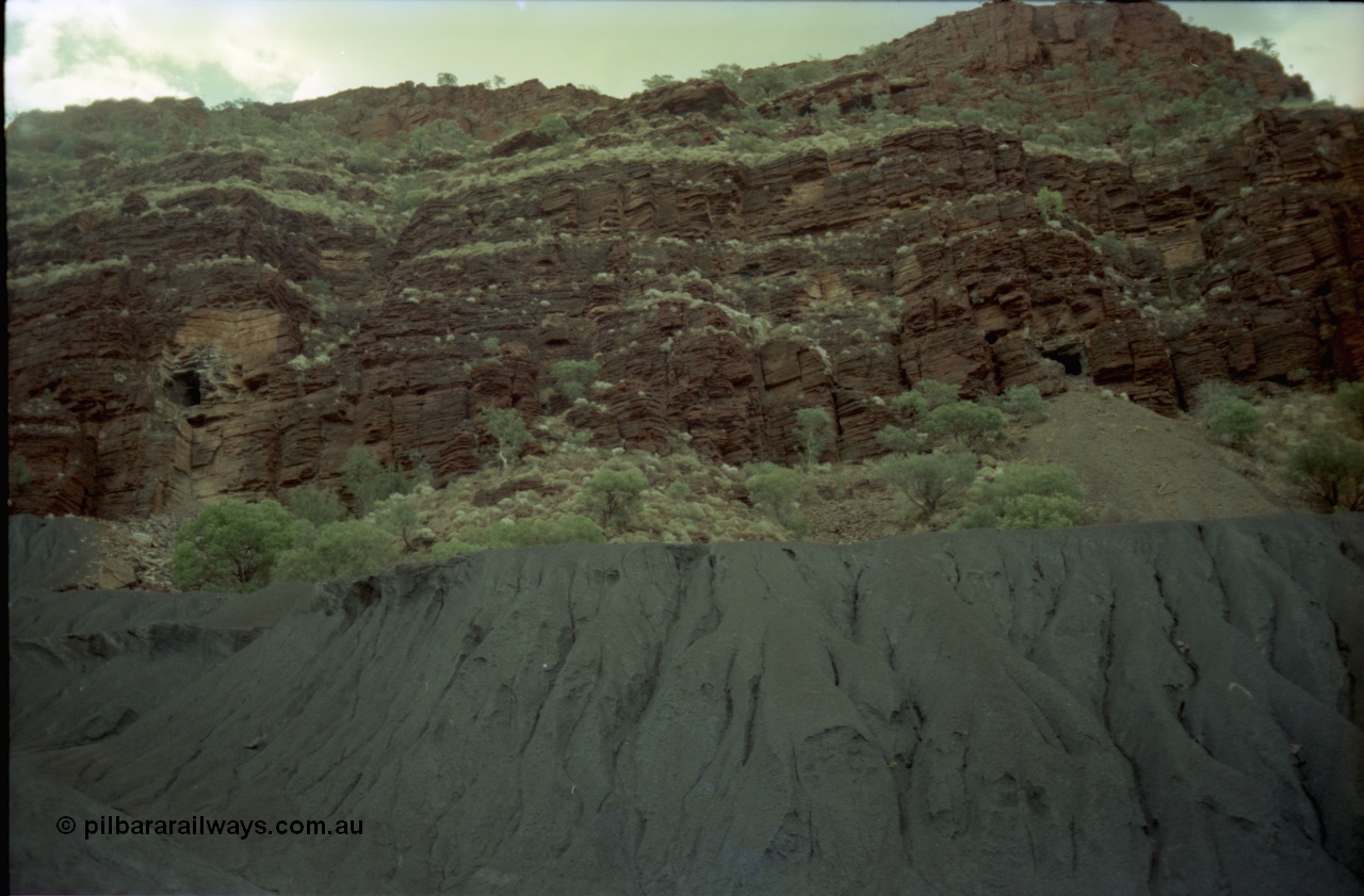 195-29
Wittenoom Gorge, Australian Blue Asbestos or ABA Colonial Mill, view of mine adits above the tailings in the west wall of the gorge.
