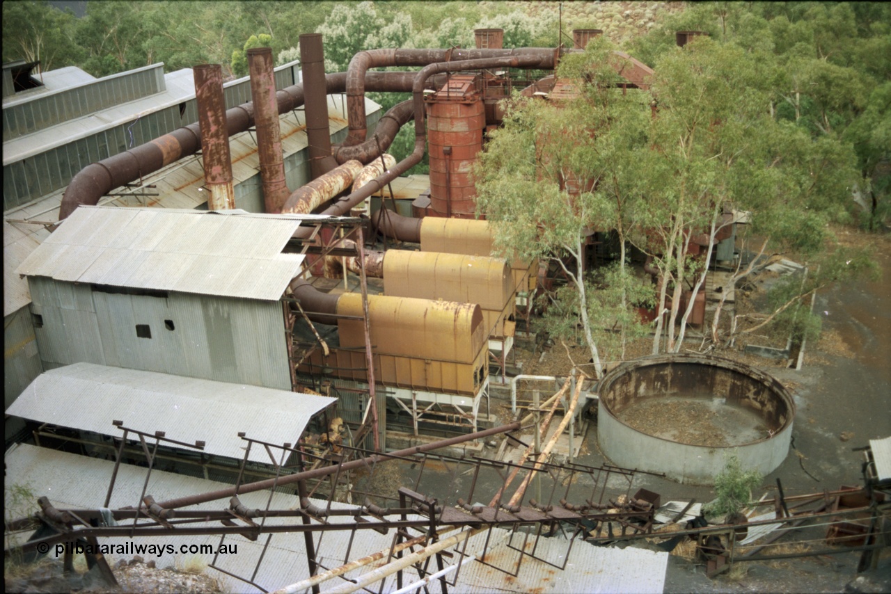 195-34
Wittenoom Gorge, Australian Blue Asbestos or ABA Colonial Mill, overview from the drier level looking down on the mills and dust collectors.
