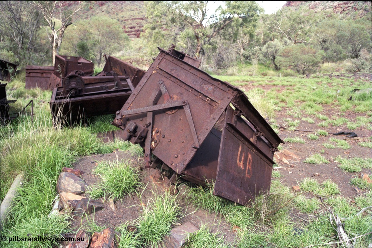 196-20
Wittenoom Gorge, Gorge Mine area, asbestos mining remains, view inside of side opening ore waggon, shows how much ore the waggons could carry.
