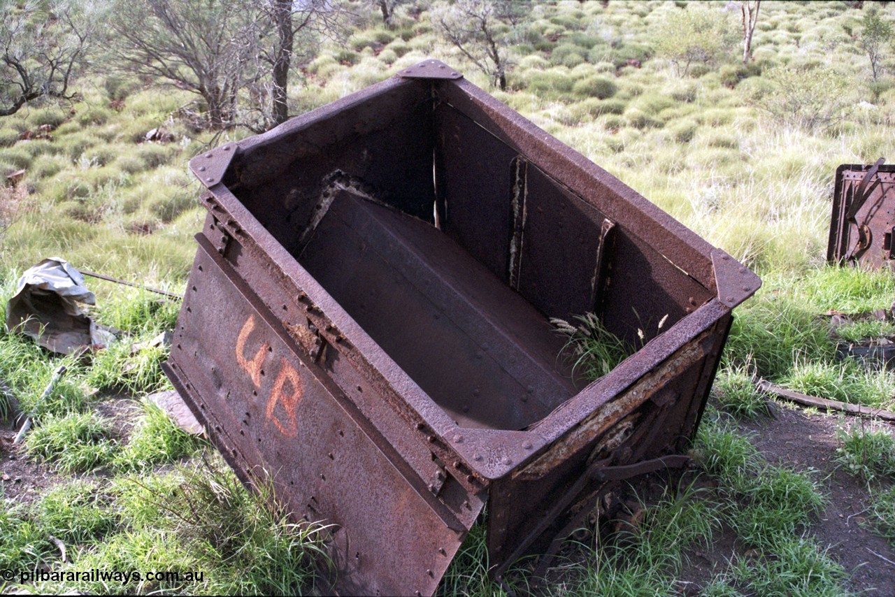 196-21
Wittenoom Gorge, Gorge Mine area, asbestos mining remains, side open self discharge ore waggons, shows door mechanism.
