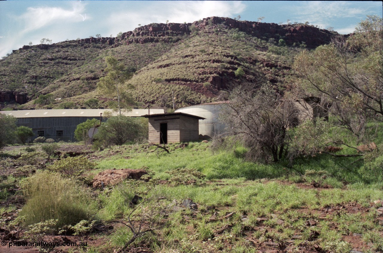 196-26
Wittenoom Gorge, view of power station generating hall with pump house and diesel storage tanks.
