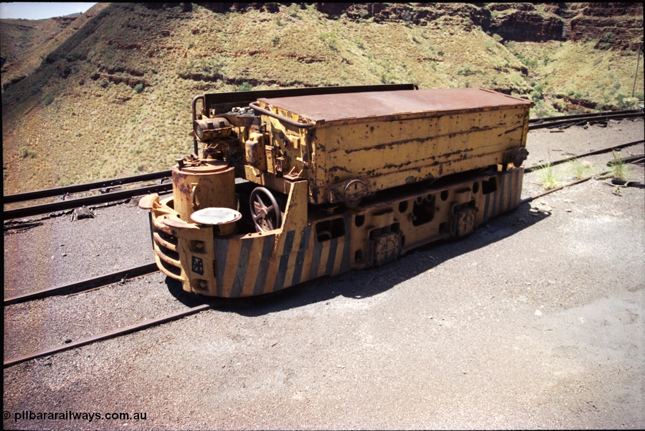 197-18
Wittenoom, Colonial Mine, asbestos mining remains, view of the drivers side of Mancha battery locomotive #4 showing general arrangement.
Keywords: Mancha;