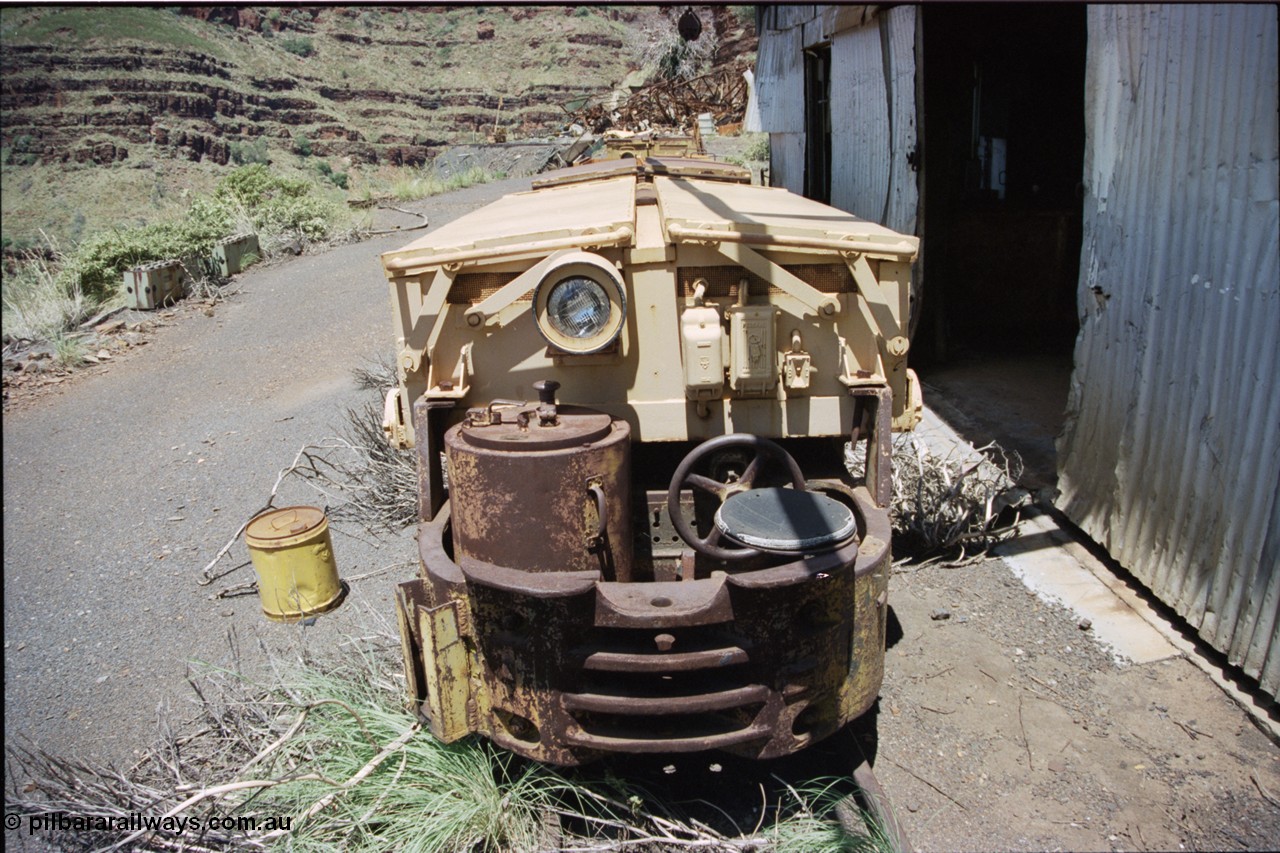 197-31
Wittenoom, Colonial Mine, front view of Mancha battery locomotive, view of drivers seat, brake wheel, controller and battery module.
Keywords: Mancha;