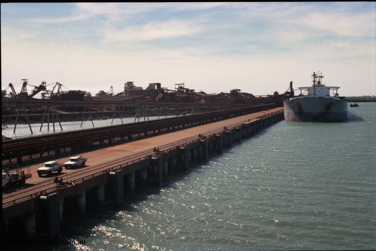 198-36
Port Hedland Port, BHP Nelson Point view of A Berth looking towards Berth B with vessel being loaded on B Berth by Shiploader One.
