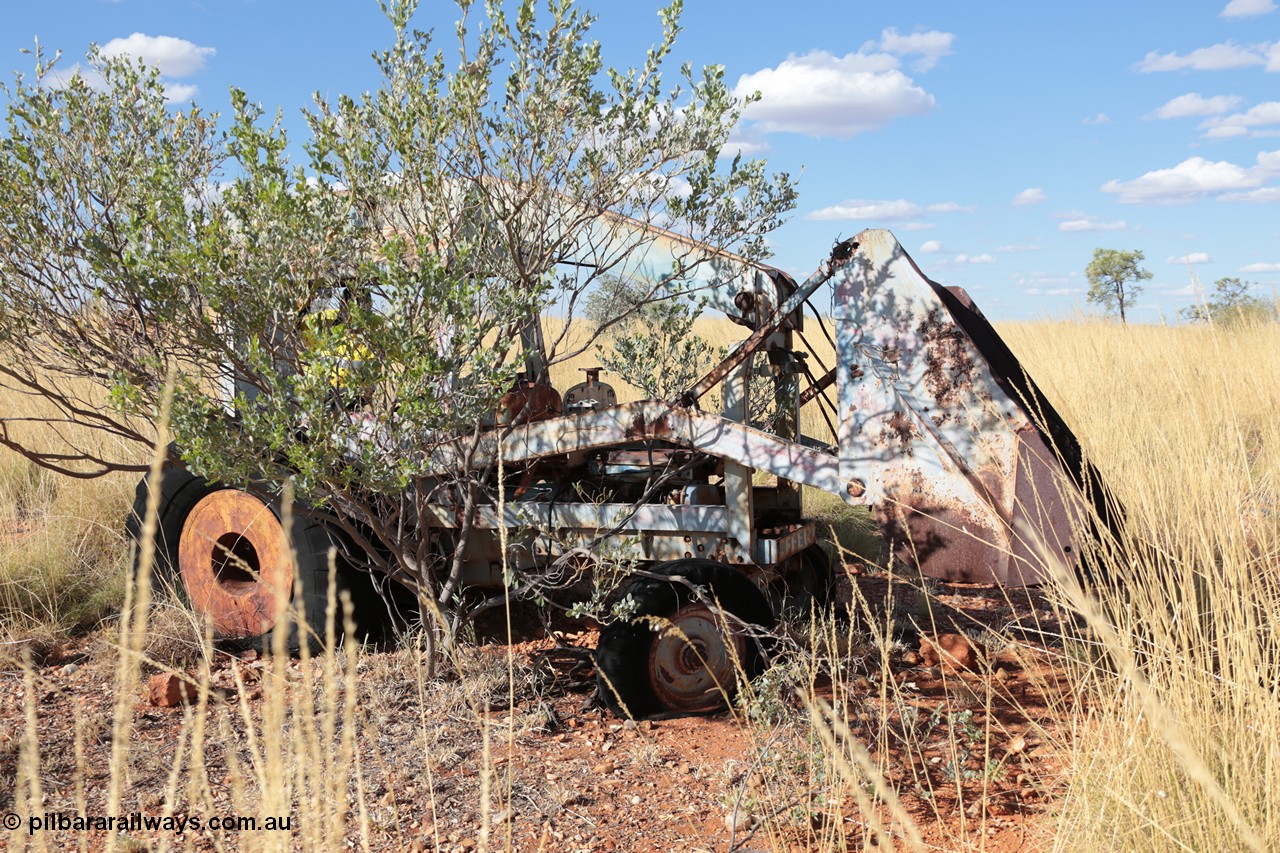 140517-4418
A Tutt Bryant rope operated Pacific A.C.E. Equipment Wheel Loader, Fordson powered?? The front end loader which lifts the bucket over the cab to feed the trammel, or dump into a truck, see an historical picture of this unit [url=http://slwa.wa.gov.au/wepon/mining/html/003547d.html]here at the Battye Library[/url] and an image of a similar unit on the [url=http://www.tuttbryant.com.au/verve/_resources/img-307150934-0003_large.jpg]manufacturer's website[/url]

