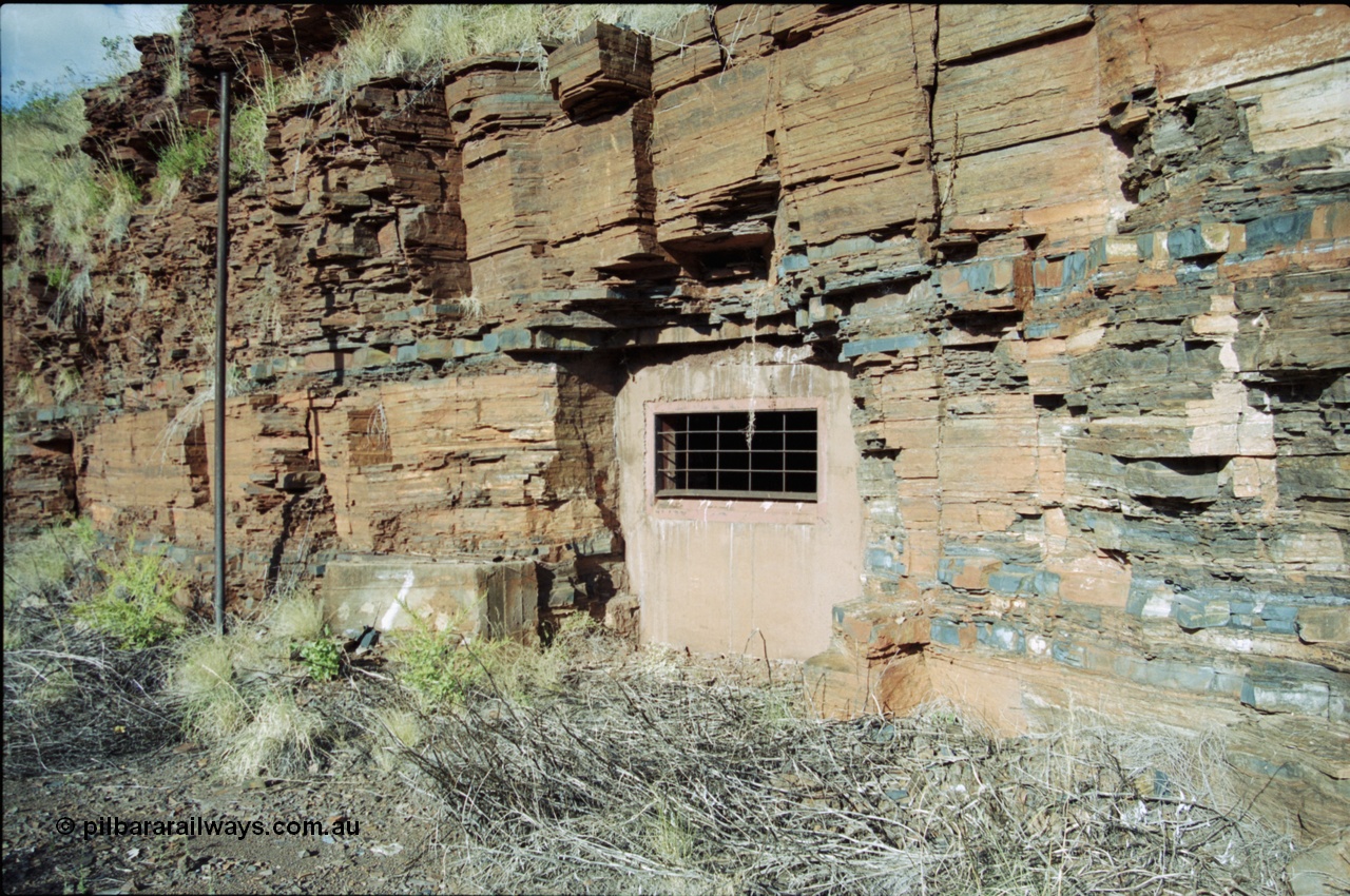 203-37
Yampire Gorge, remains of asbestos mining, sealed up drive entry No. 7.
