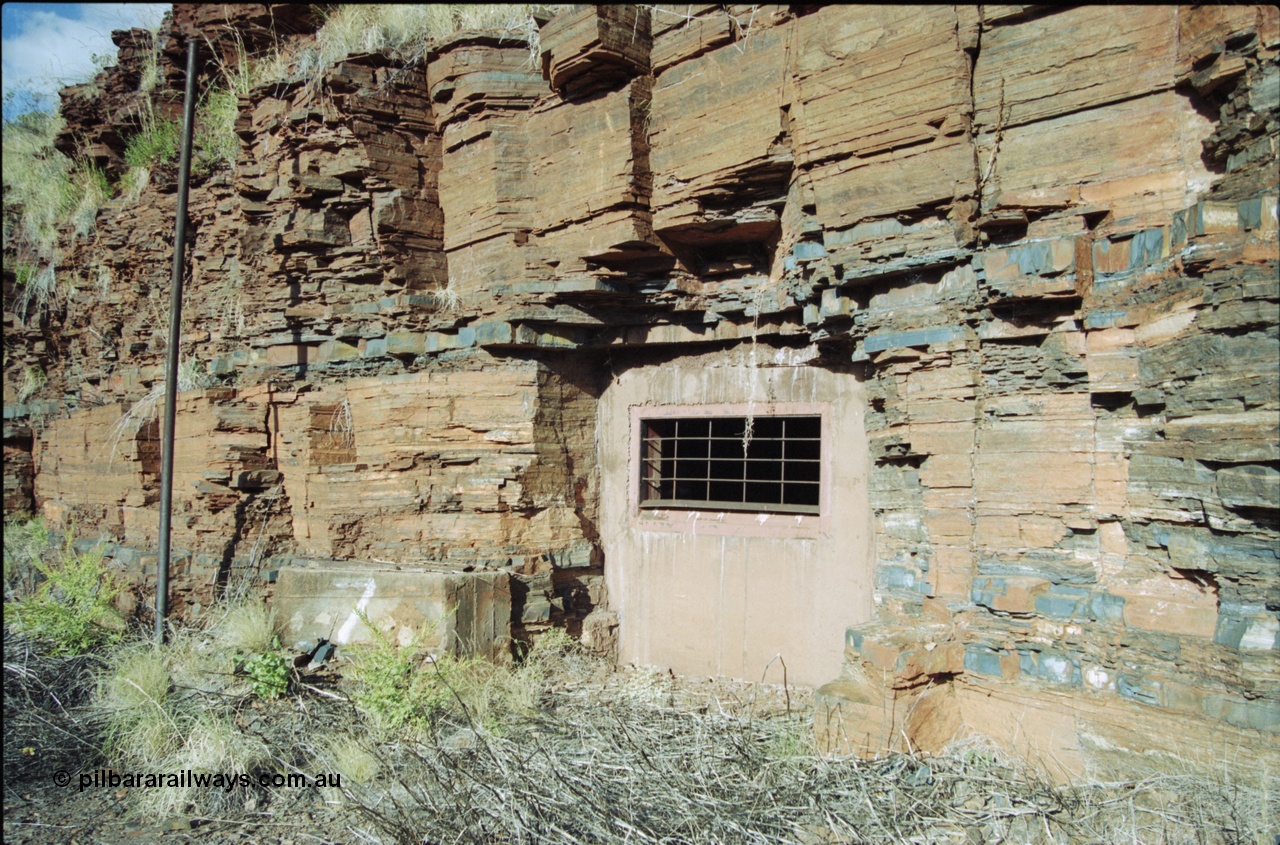 204-00
Yampire Gorge, remains of asbestos mining, sealed up drive entry No. 7.
