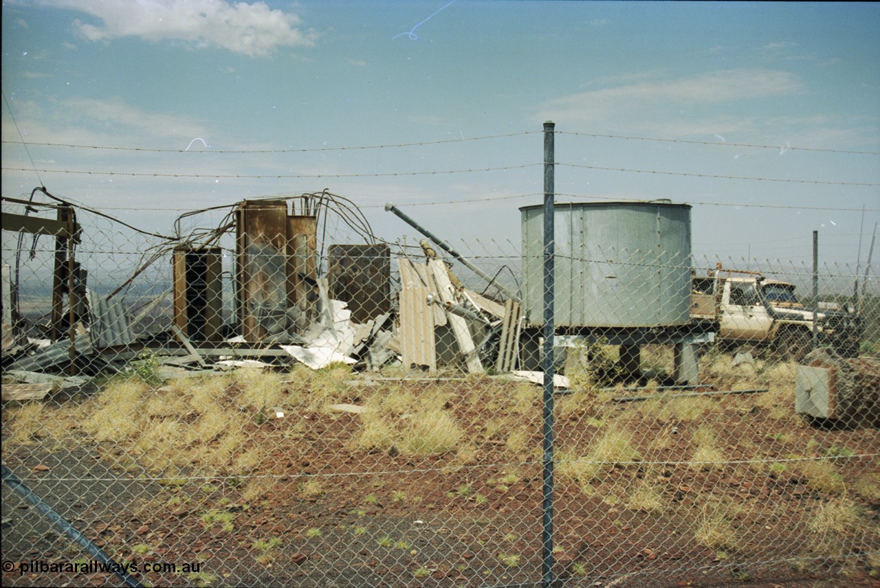 205-25
Drillers Ridge, Wittenoom, the DME (Distance Measuring Equipment) tower (located at 957 metres) was a navigation aid for the Department of Civil Aviation for the Wittenoom airport, the site was also used by Telecom for providing 'radio links' for phones into Wittenoom prior to the current tower located at the eastern edge of town which links back to Auski Roadhouse.
