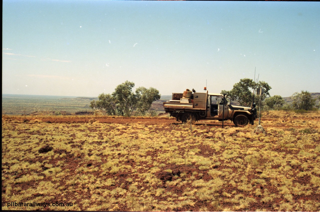 205-30
Koodaideri, survey mark or trig point, looking east with Fortescue valley on the left, Rio wants to mine in this area, and have been playing around here for many years.
