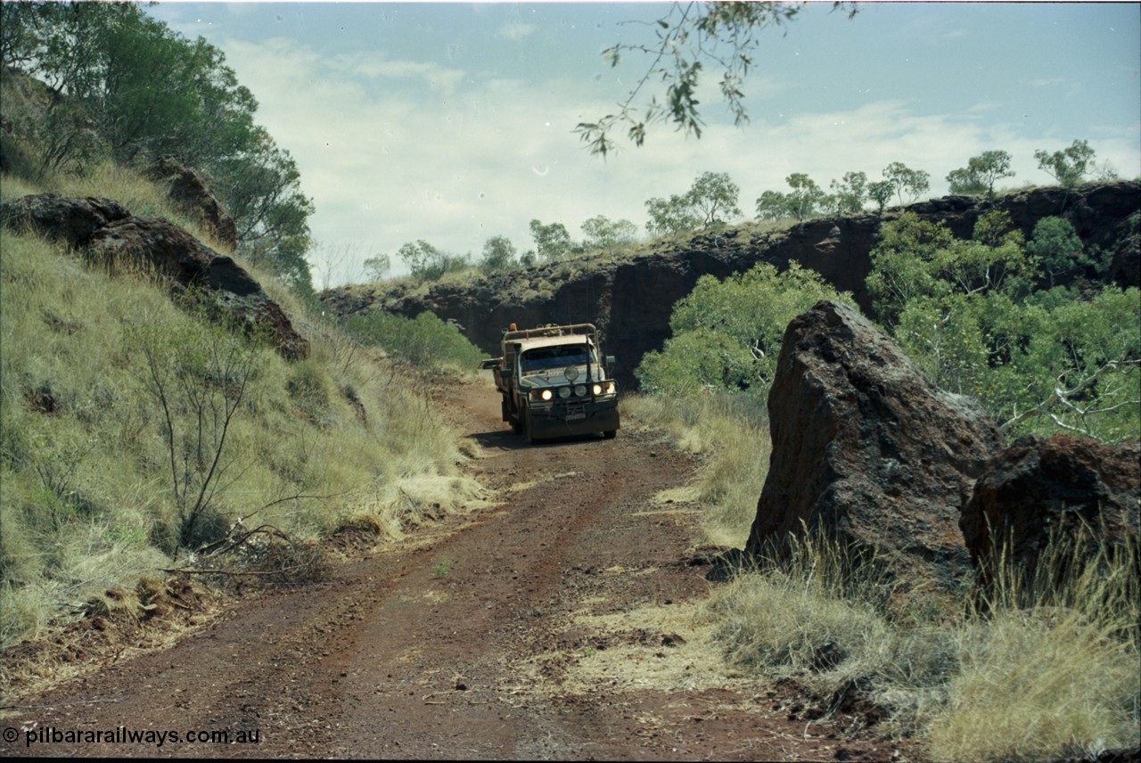 205-36
Koodaideri, track leading up to the underground drive, about 500 metres before the drive was a big warning sign about radio active substances.
