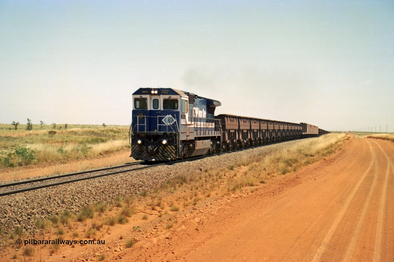 206-28
An empty train on the Yarrie (former Goldsworthy) line behind BHP 5633 'Hephaestus' built new in 1988 by Goninan as a GE CM39-8 model, serial 5831-12 / 88-082. The four CM39-8 units were upgraded to CM40-8 units following overhauls and finally scrapped in January 2016.
Keywords: 5633;Goninan;GE;CM39-8;5831-12/88-082;