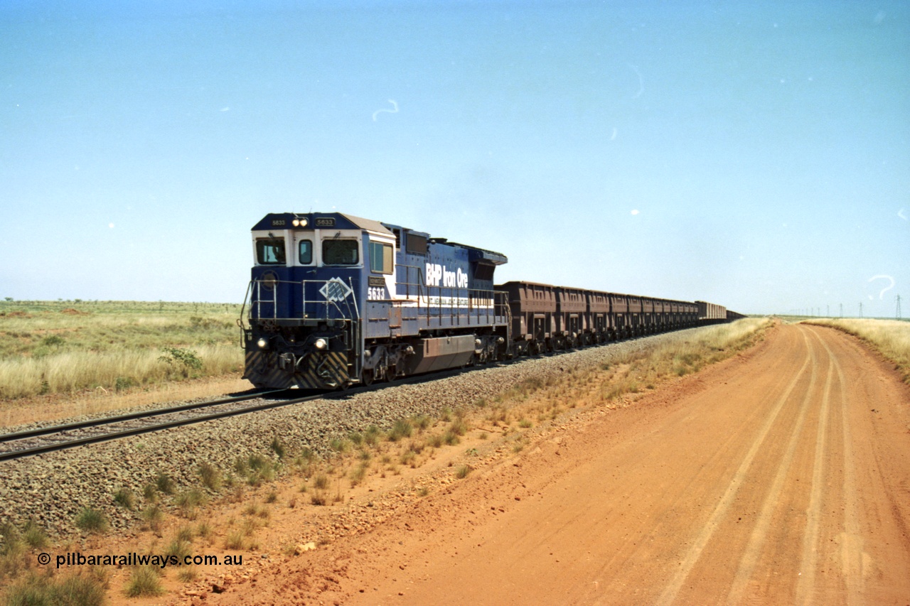 206-29
An empty train on the Yarrie (former Goldsworthy) line behind BHP 5633 'Hephaestus' built new in 1988 by Goninan as a GE CM39-8 model, serial 5831-12 / 88-082. The four CM39-8 units were upgraded to CM40-8 units following overhauls and finally scrapped in January 2016.
Keywords: 5633;Goninan;GE;CM39-8;5831-12/88-082;