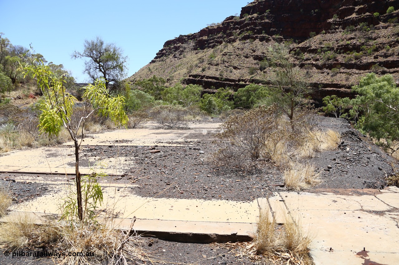 160101 9769
Wittenoom Gorge, Gorge Mine area, asbestos mining remains, concrete slab for railway workshops, track set in concrete. Location of image is [url=https://goo.gl/maps/ADFfM5kEkGm]here[/url].
