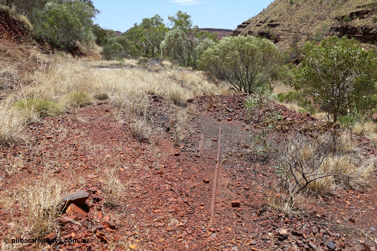 160101 9801
Wittenoom Gorge, Gorge Mine area, looking east along the north wall with the drive line to the adits, old rails embedded in track. [url=https://goo.gl/maps/W1kHXV2XJfyeVTWm6]GeoData[/url].
