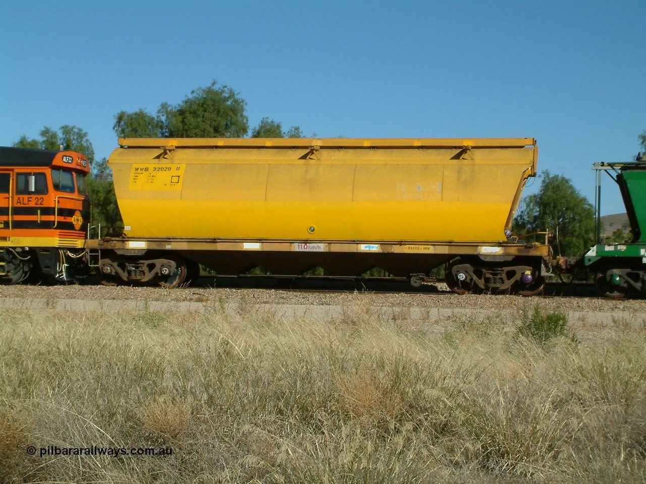 030403 153850
Gladstone, former WAGR owned grain waggon built by Scotts of Ipswich Qld in 1966-67 as a WW type waggon, later converted to WWS type, here WWS 32029 is being loaded as part of an Australian Southern grain working, these waggons were later coded AGSY type. 3rd April 2003.
Keywords: WWS-type;WWS32029;Scotts-Qld;