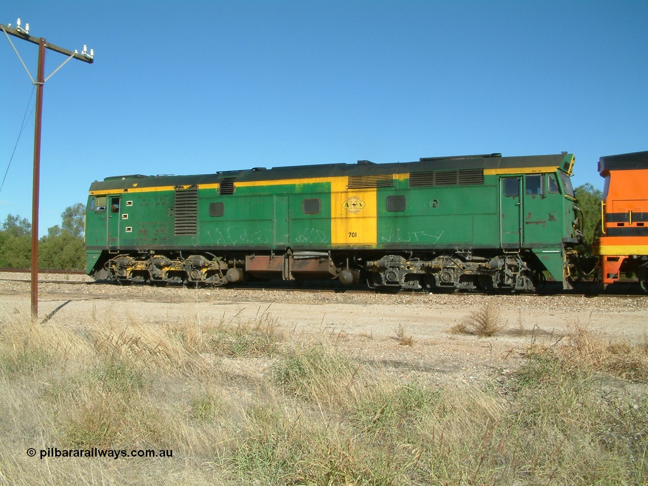 030403 154252
Gladstone, former South Australian Railways AE Goodwin built DL500G ALCo designated the 700 class, class leader 701 serial G6042-2 leads a grain train being loaded on the 3rd April 2003.
Keywords: 700-class;701;AE-Goodwin;ALCo;DL500G;G6042-2;