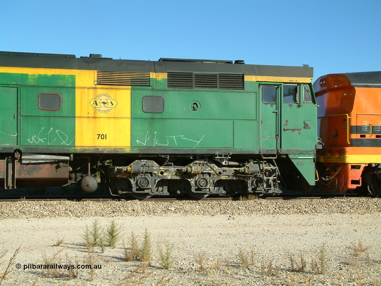 030403 154841
Gladstone, former South Australian Railways AE Goodwin built DL500G ALCo designated the 700 class, class leader 701 serial G6042-2, B end cab side shot, leads a grain train being loaded on the 3rd April 2003.
Keywords: 700-class;701;AE-Goodwin;ALCo;DL500G;G6042-2;