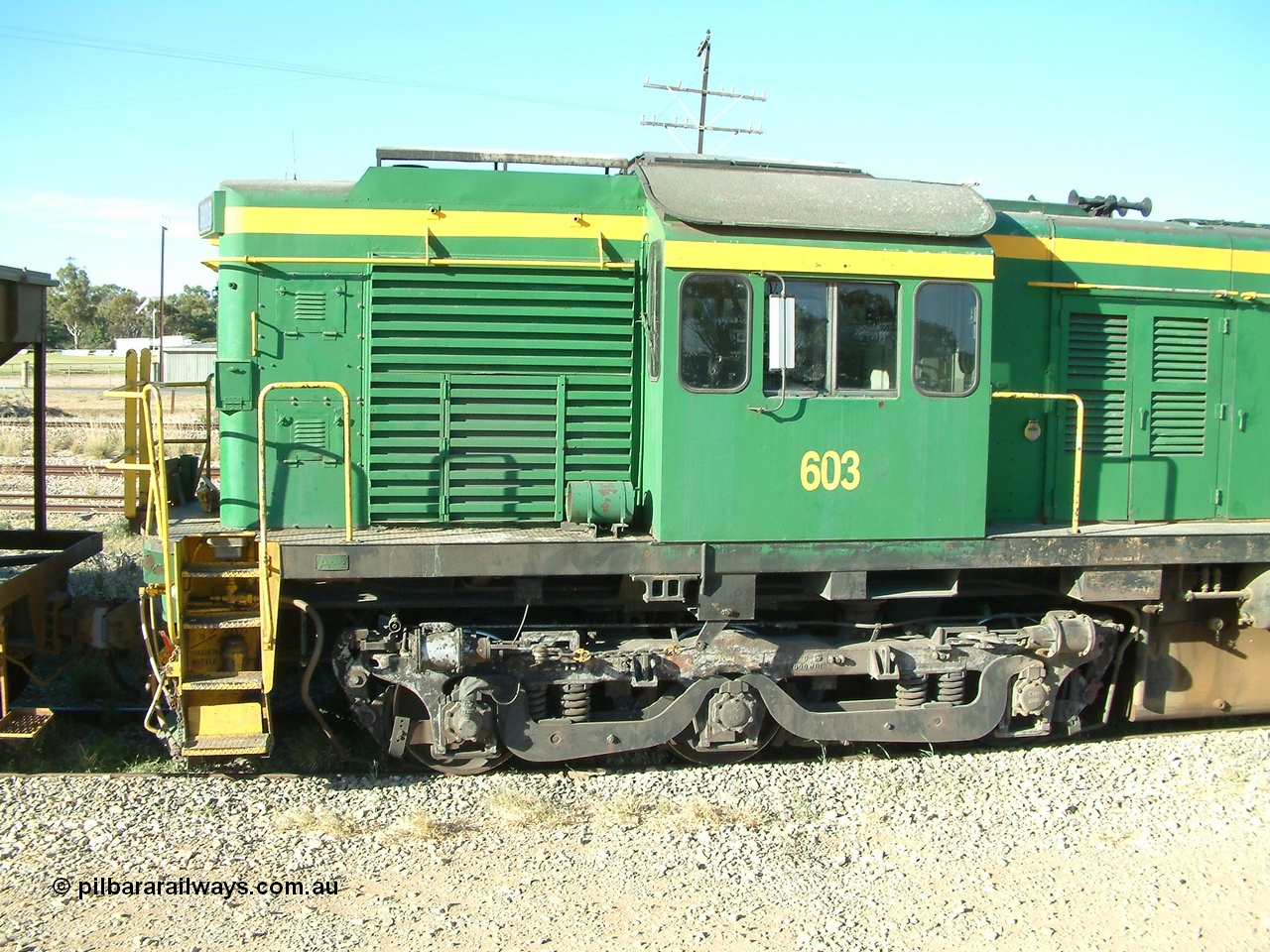 030403 162332
Crystal Brook, cab detail view showing tropical roof and bogie of former Australian National 600 class AE Goodwin built ALCo DL541 model 603 serial G6015-2.
Keywords: 600-class;603;AE-Goodwin;ALCo;DL541;G6015-2;