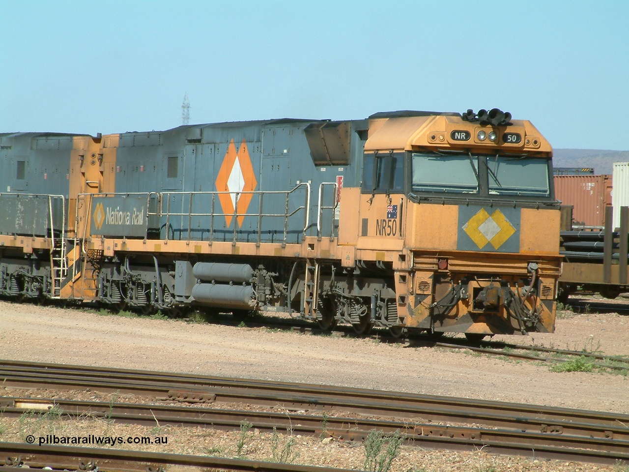 030404 103712
Port Augusta Spencer Junction yard, National Rail Goninan built GE Cv40-9i model NR class unit NR 50 serial 7250-08 / 97-252 lay about the yard in between jobs. 4th April 2003.
Keywords: NR-class;NR50;Goninan;GE;Cv40-9i;7250-08/97-252;