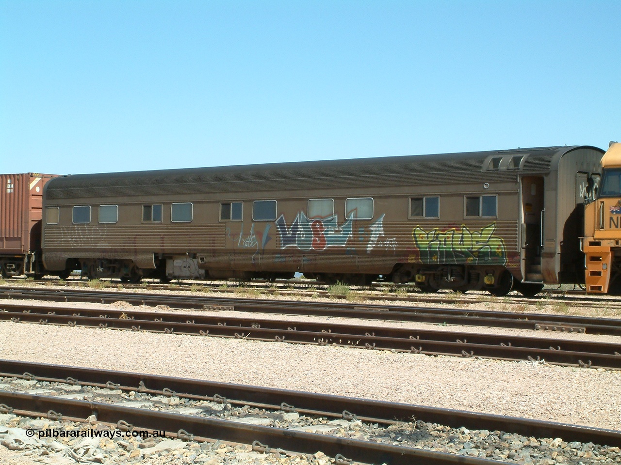 030404 125244
Port Augusta Spencer Junction yard, crew coach on Perth bound intermodal. 4th April 2003.
