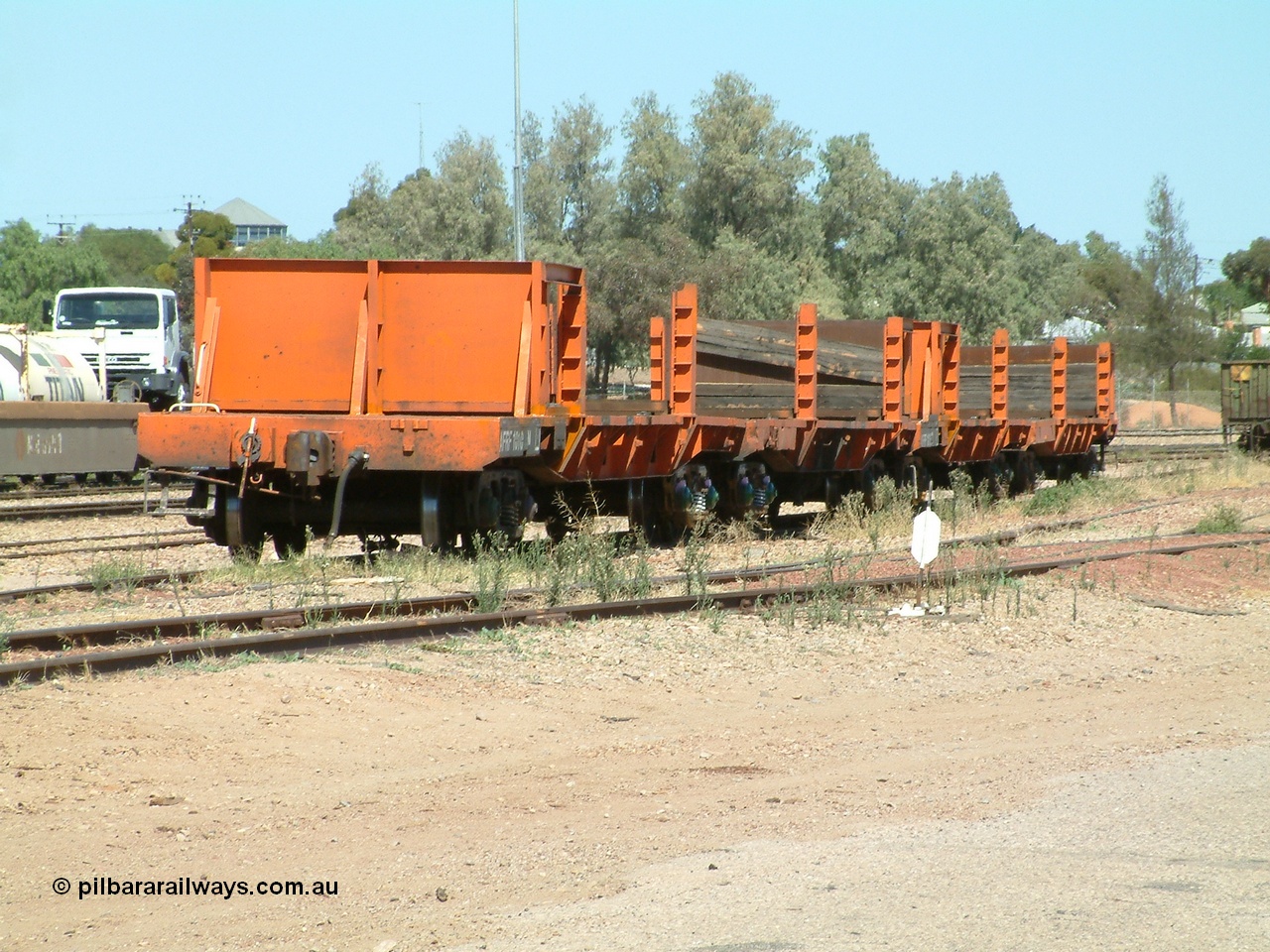 030404 130919
Port Augusta Spencer Junction yard, a couple of AFRF type rail transport waggons await shunting back to Whyalla for reloading during the Darwin line construction. 4th April 2003.
Keywords: AFRF-type;