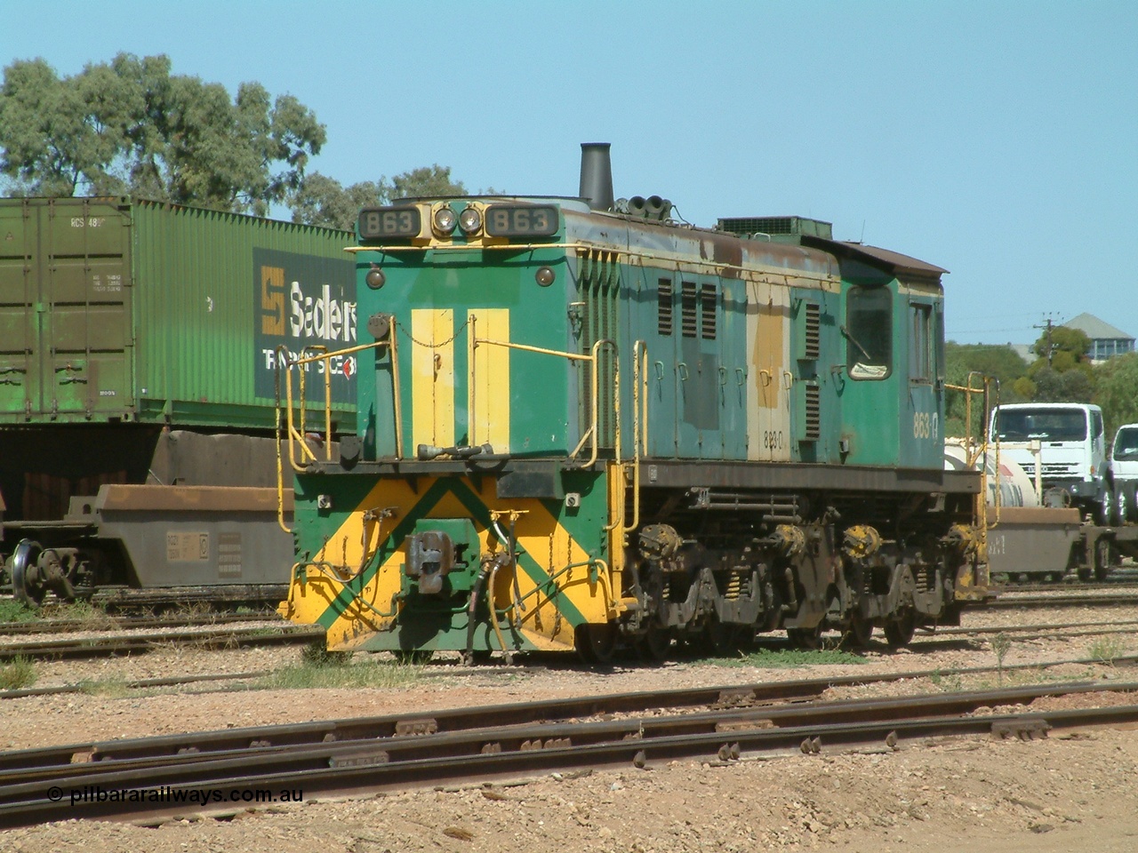 030404 131500
Port Augusta, Spencer Junction shunt loco 830 class unit 863 serial 84709 is an AE Goodwin built ALCo DL531 model and entered service in June 1963. 4th April 2003.
Keywords: 830-class;863;AE-Goodwin;ALCo;DL531;84709;