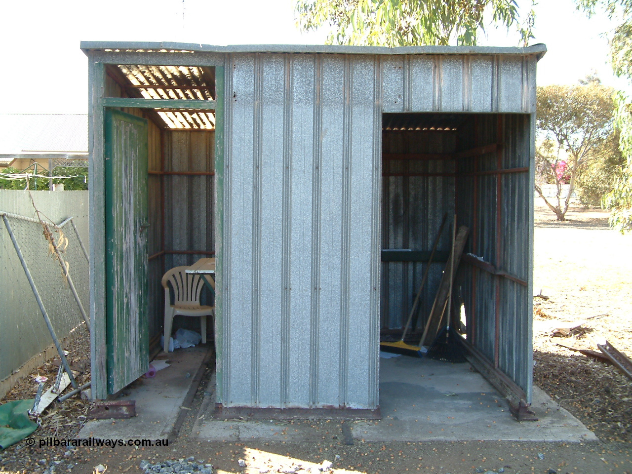 030406 095220
Cummins, second hand train control shed and waiting shelter sitting on the site of the former gangers trolley shed. 6th April 2003.
