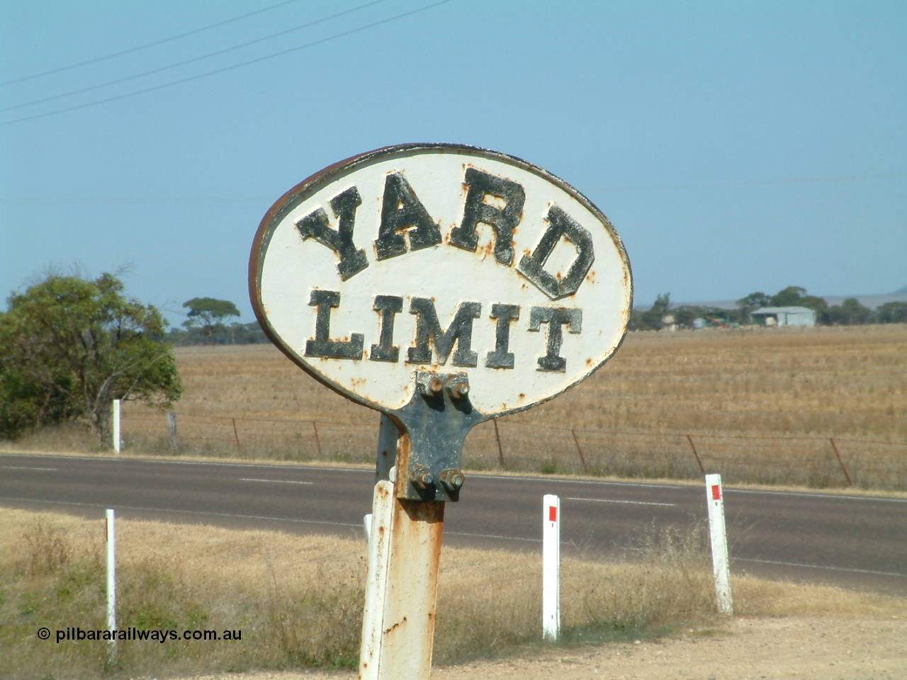 030406 101336
Cummins, original cast iron 'A6' type South Australian Railways, or SAR, YARD LIMIT sign bolted to a rail post. April 6, 2003.
