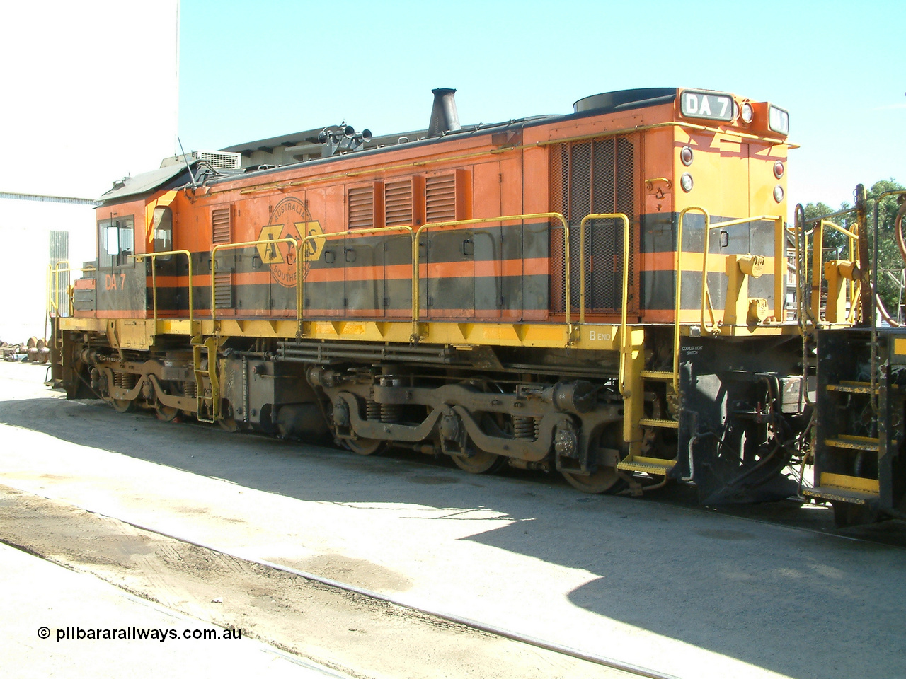 030406 114546
Port Lincoln loco workshops, wearing Australian Southern livery rebuild ALCo locomotive unit DA 7 started life as NSWGR 48 class 4813 AE Goodwin ALCo model DL531 serial 83713, rebuilt by Islington Workshops with long hood and parts from former 830 class 870 AE Goodwin ALCo model DL531 serial G6016-06 in 1998. B end roster view looking forward. 6th April 2003.
Keywords: DA-class;DA7;83713;Port-Augusta-WS;ALCo;DL531G/1;48-class;4813;rebuild;