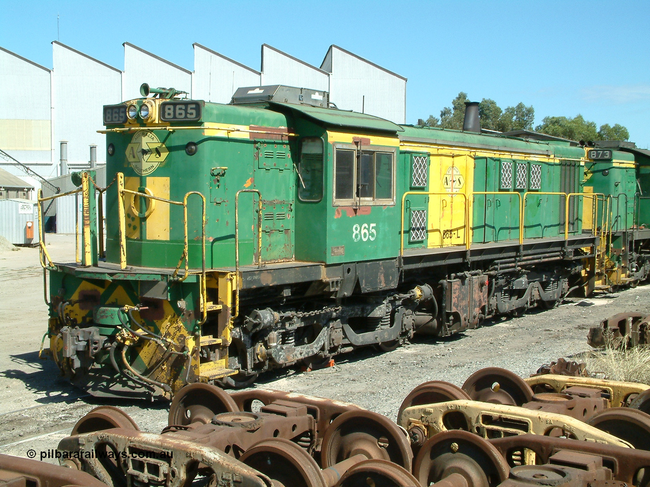 030406 115158
Port Lincoln loco workshops, still in former owner AN livery, Australian Southern 830 class locomotive 865 AE Goodwin ALCo model DL531 serial 84711, roster shot coupled to sister unit. 6th April 2003.
Keywords: 830-class;865;AE-Goodwin;ALCo;DL531;84711;