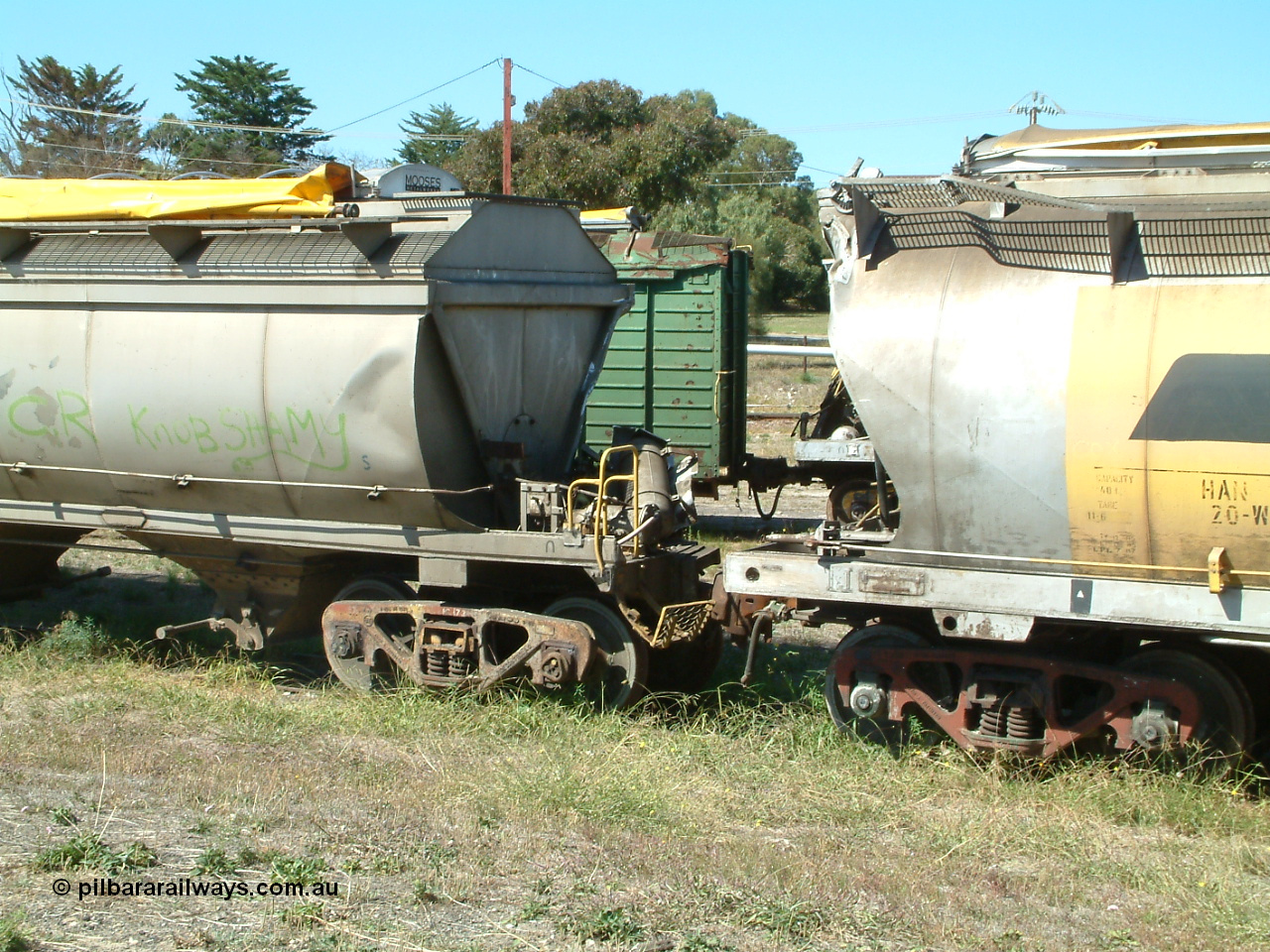 030406 115608
Port Lincoln, derailment damaged SAR Islington Workshops built HAN type bogie wheat waggons HAN 20, non-handbrake end and an unidentified HCN type close up of non-handbrake end damage, stored at the workshops yards. 6th April 2003.
Keywords: HAN-type;HAN20;1969-73/68-20;SAR-Islington-WS;
