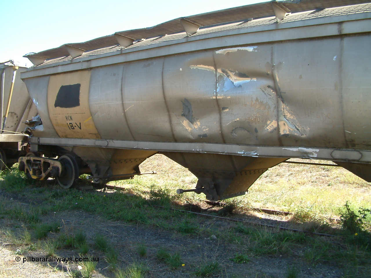 030406 115702
Port Lincoln, derailment damaged HCN type bogie wheat waggon HCN 18, modified at Islington Workshops in 1978-80 which started life as a Tulloch built NHB type iron ore hopper for the CR on the North Australia Railway in 1968-69. It was scrapped in May 2003, not long after this image was taken. 6th April 2003.
Keywords: HCN-type;HCN18;SAR-Islington-WS;rebuild;Tulloch-Ltd-NSW;NHB-type;NHB1010;
