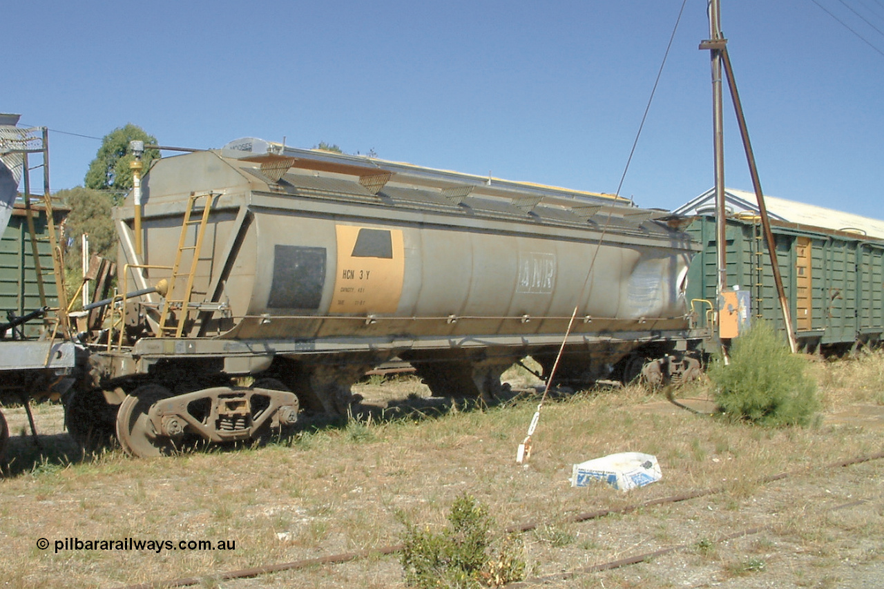 030406 115746
Port Lincoln, derailment damaged HCN type bogie wheat waggon HCN 3, modified at Islington Workshops in 1978-80 which started life as a Tulloch built NHB type iron ore hopper for the CR on the North Australia Railway in 1968-69. 6th April 2003.
Keywords: HCN-type;HCN3;SAR-Islington-WS;rebuild;Tulloch-Ltd-NSW;NHB-type;NHB1595;