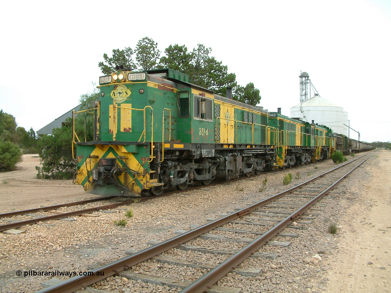 030407 120514
Poochera, the loaded train prepares to depart behind 830 class unit 851 AE Goodwin ALCo model DL531 serial 84137, 851 has spent its entire operating career on the Eyre Peninsula, it leads fellow 830 class 842 serial 84140 and a rebuilt unit DA 4, rebuilt from 830 class unit 839 by Port Augusta Workshops, retains original serial 83730 and model DL531.
Keywords: 830-class;851;AE-Goodwin;ALCo;DL531;84137;