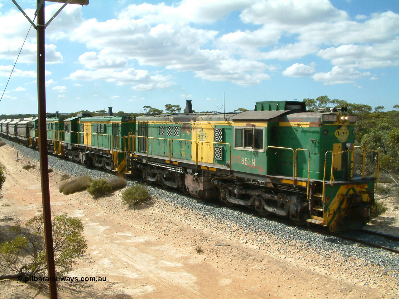 030409 110610
Caralue, loaded grain train working south of the former station site 830 class unit 851 AE Goodwin ALCo model DL531 serial 84137, 851 has spent its entire operating career on the Eyre Peninsula, it leads fellow 830 class 842 serial 84140 and a rebuilt unit DA 4, rebuilt from 830 class unit 839 by Port Augusta Workshops, retains original serial 83730 and model DL531 and two XNW grain waggons.
Keywords: 830-class;851;AE-Goodwin;ALCo;DL531;84137;