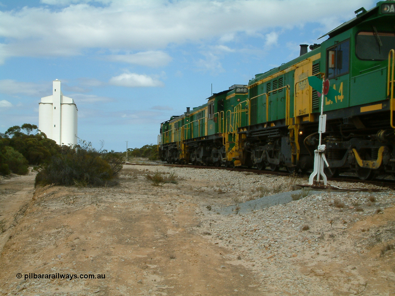 030409 122744
Kielpa, loaded grain train with 830 class unit 851 AE Goodwin ALCo model DL531 serial 84137, 851 has spent its entire operating career on the Eyre Peninsula, leads fellow 830 class 842 serial 84140 and a rebuilt unit DA 4 rumbles over the north end points heading south.
