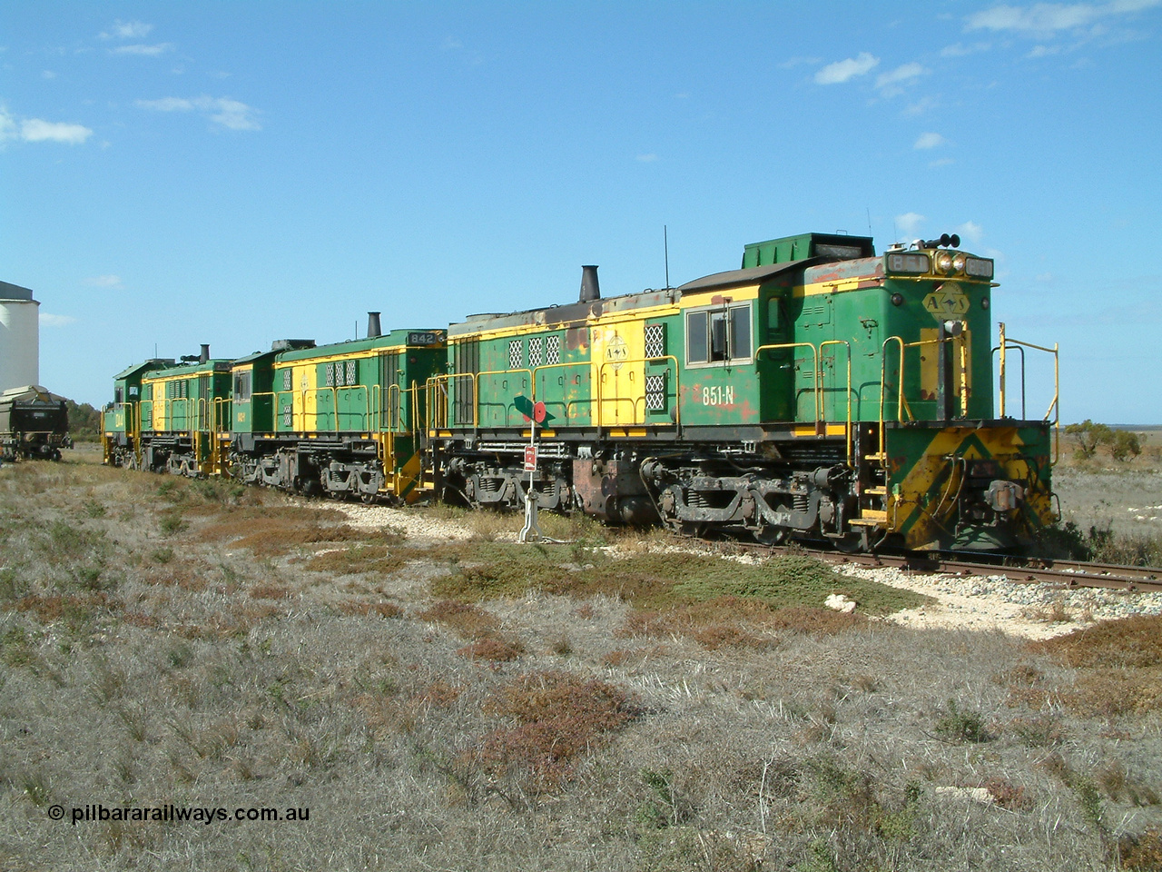 030409 140653
Wharminda, the engines 830 class unit 851 AE Goodwin ALCo model DL531 serial 84137, fellow 830 class 842 serial 84140 and a rebuilt unit DA 4 have cut off and run forward as they shunt to pick up loaded waggons.
Keywords: 830-class;851;AE-Goodwin;ALCo;DL531;84137;