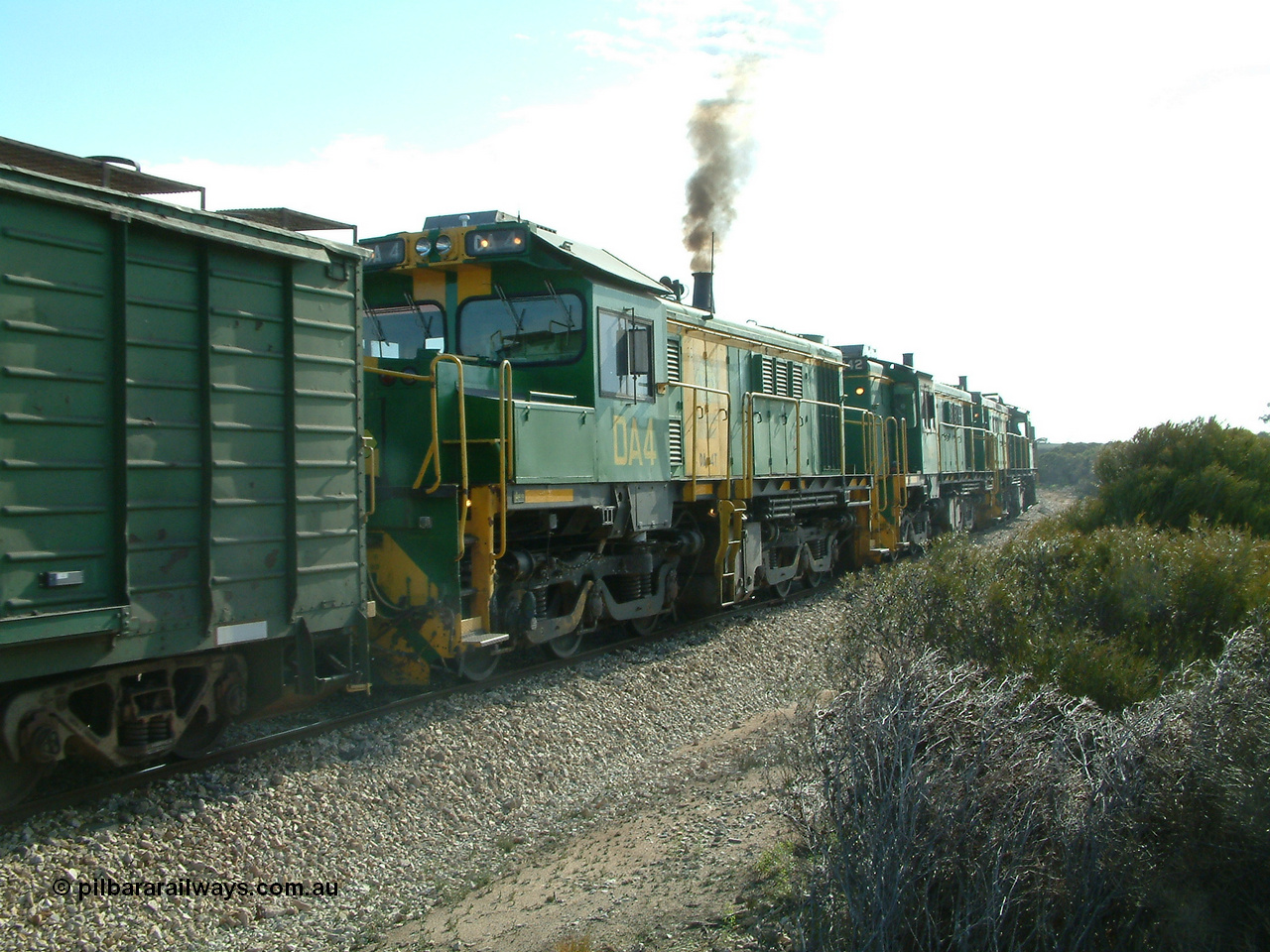 030409 153952
Moody Tank, a loaded grain train storms around the curve behind 830 class unit 851 AE Goodwin ALCo model DL531 serial 84137, fellow 830 class 842 serial 84140 and a rebuilt DA class unit DA 4, trailing view.
Keywords: DA-class;DA4;83730;Port-Augusta-WS;ALCo;DL531G/1;830-class;839;rebuild;
