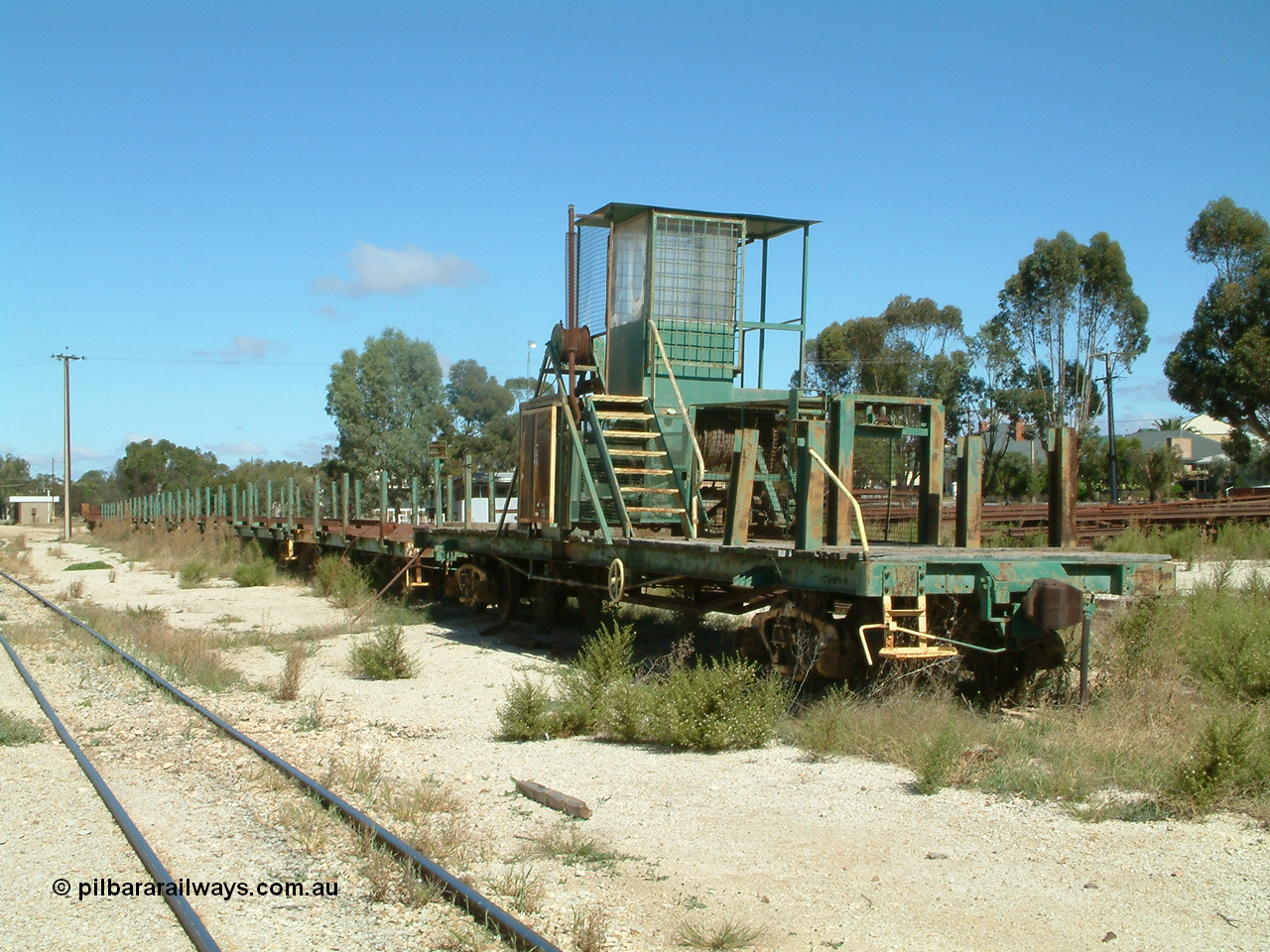 030411 105938
Kimba, rail recovery waggon set with winch waggon EZWL 2, eight ENFR type and one ENFB type waggons. The cabin is mounted above the motor, built using underframe of broad gauge horse box BH 4331. To Eyre Peninsula 1992, re-coded then from AZWL. Scrapped in 2005.
Keywords: EZWL-type;EZWL2;SAR-Islington-WS;BH-type;BH4331;