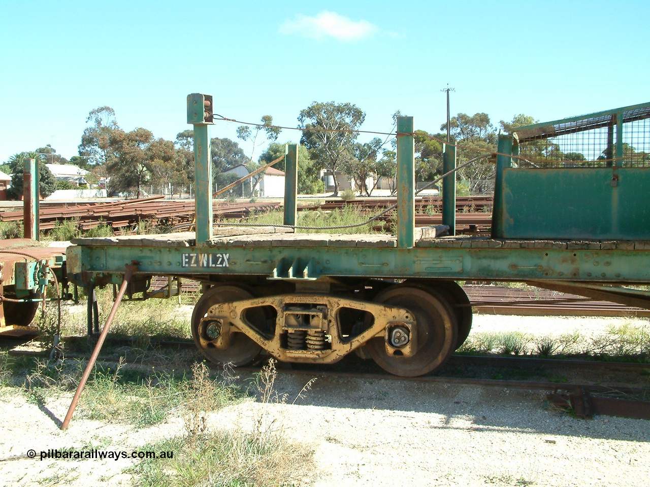 030411 110018
Kimba, rail recovery winch waggon EZWL 2, built using underframe of broad gauge horse box BH 4331. To Eyre Peninsula 1992, recoded then from AZWL.
Keywords: EZWL-type;EZWL2;SAR-Islington-WS;BH-type;BH4331;