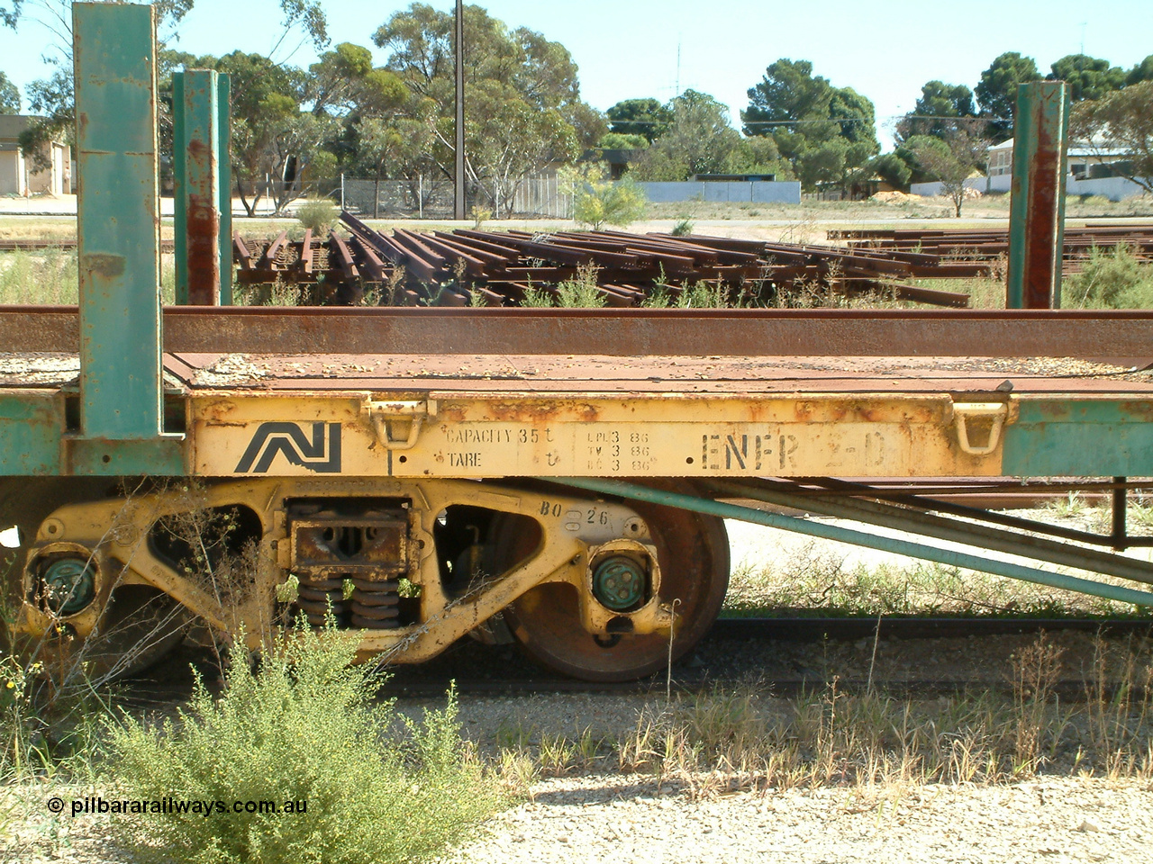 030411 110040
Kimba, rail transport waggon ENFR 2, originally built as 40' flat waggon NRF 900 in 1943. Transferred to Eyre Peninsula in 1984 and recoded to ENFR in 1985. Scrapped here at Kimba in 2005.
Keywords: ENFR-type;ENFR2;NRF900;NRF-type;