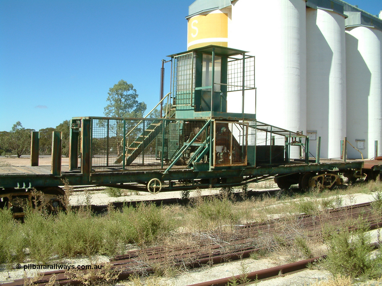 030411 110227
Kimba, rail recovery winch waggon EZWL 2, shows cabin mounted above motor and winch, built using underframe of broad gauge horse box BH 4331. To Eyre Peninsula 1992, recoded then from AZWL. Scrapped in 2005.
Keywords: EZWL-type;EZWL2;SAR-Islington-WS;BH-type;BH4331;