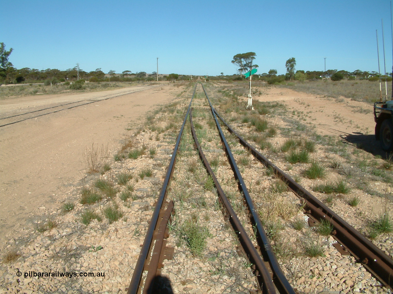 030411 154247
Wirrulla , yard view looking south, goods loop rejoining from the right, grain loop on the left. 
